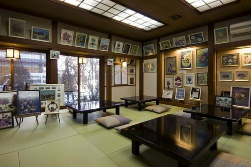 Гостиница Kusatsu Onsen Ekinariya Ryokan