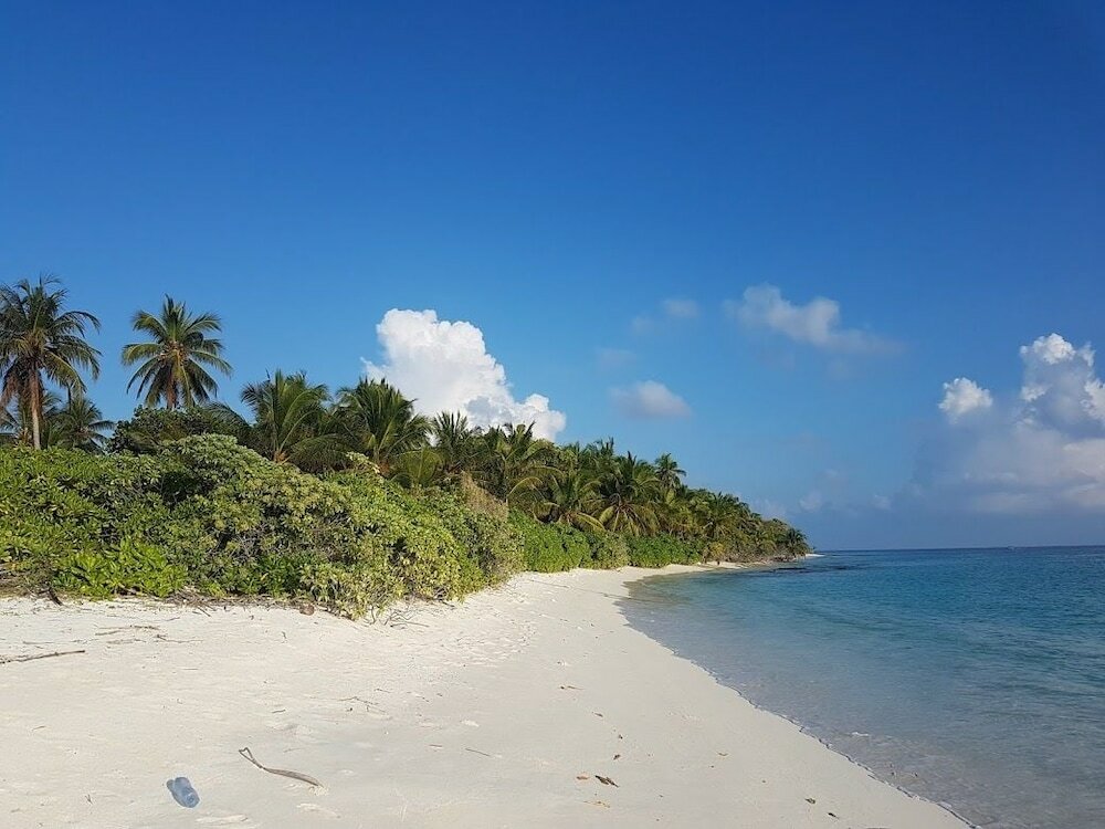 Фото Thoddoo Beach Holiday Inn