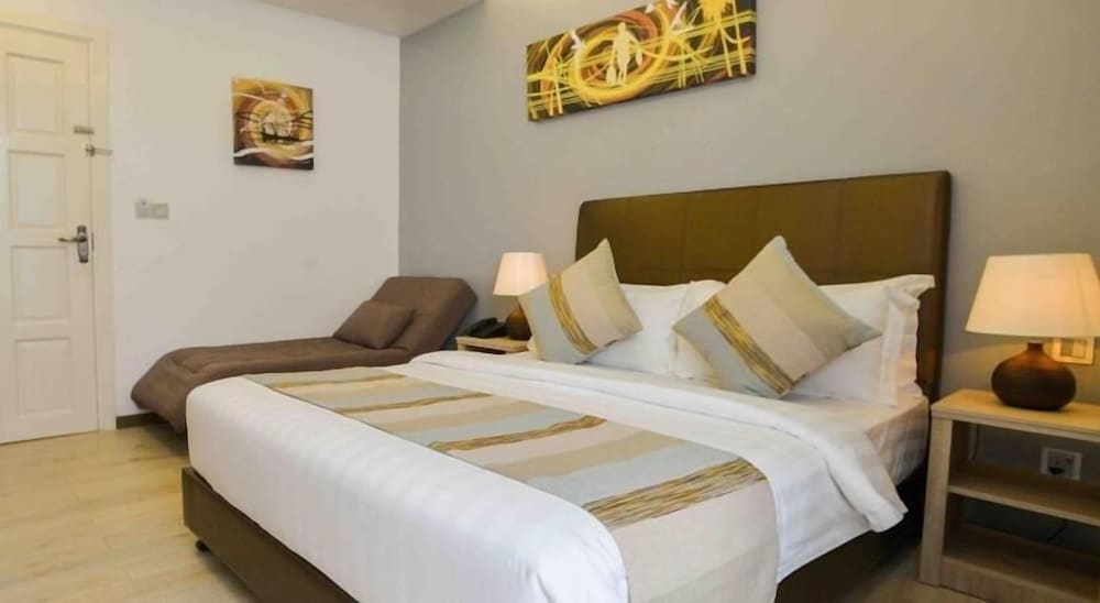 Фото Coconut Tree Hulhuvilla Beach