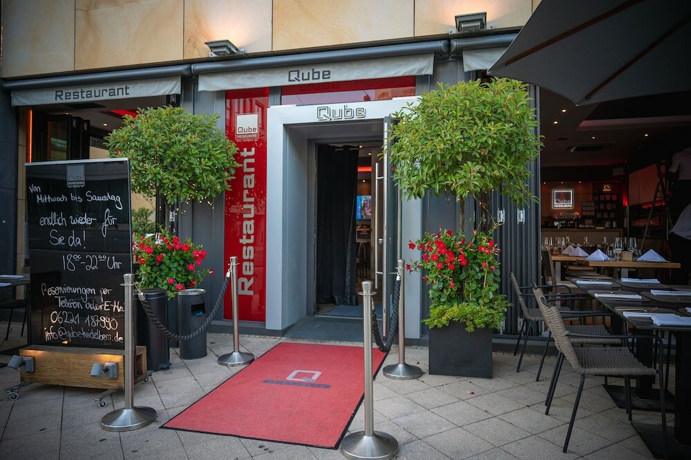 Фото Qube Hotel Bergheim