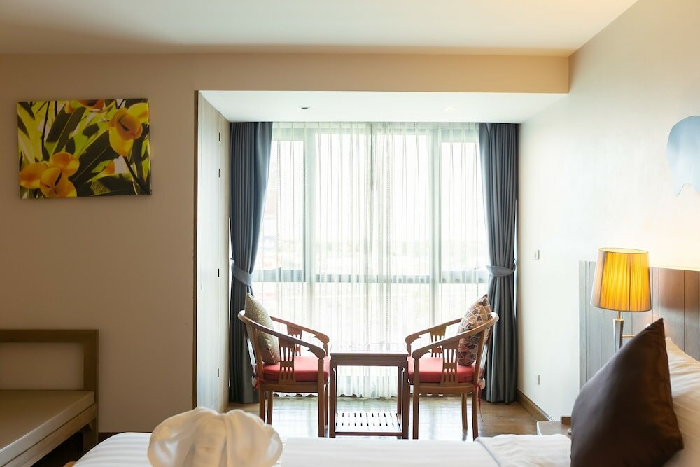 Фото Grand Ratchapruek Hotel