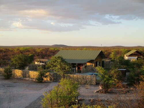 Гостиница Mopane Village Lodge Etosha