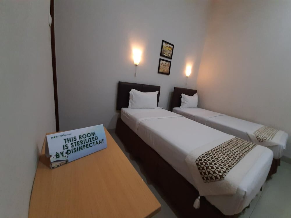 Фото Natura Rumah Singgah Guest House
