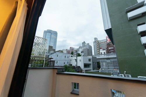 Гостиница Satellite Hotel Roppongi в Токио