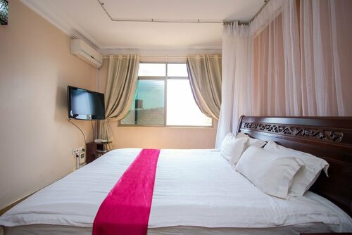 Гостиница Eight Winx Hotel в Кампале