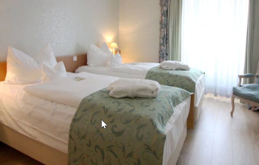 Фото Hotel am Mühlenteich