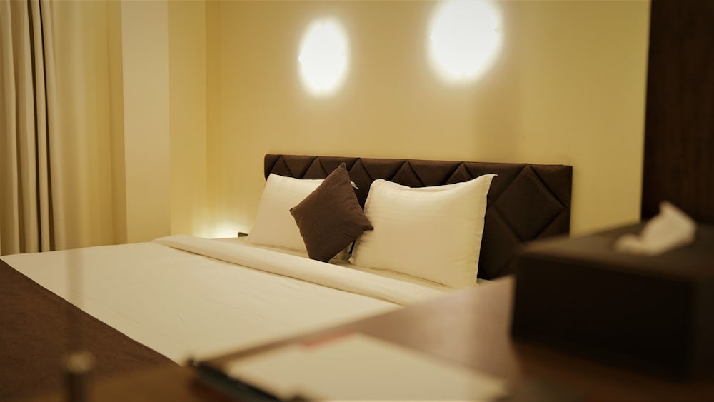 Фото De Glance Hotel