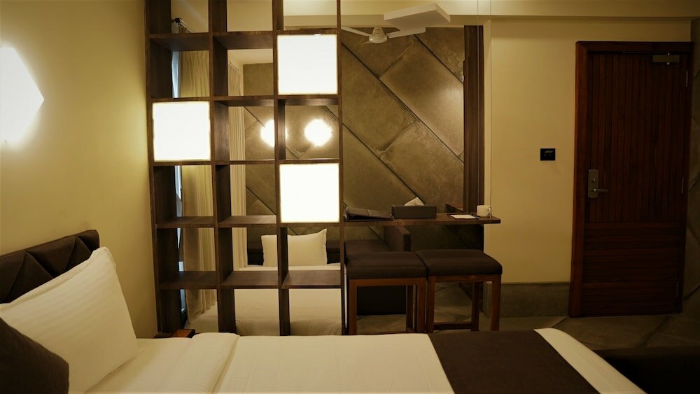 Фото De Glance Hotel