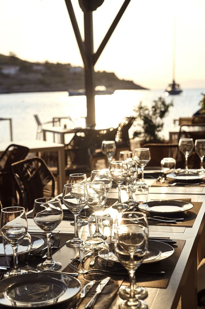 Фото Mandraki Beach Resort - Adults Only