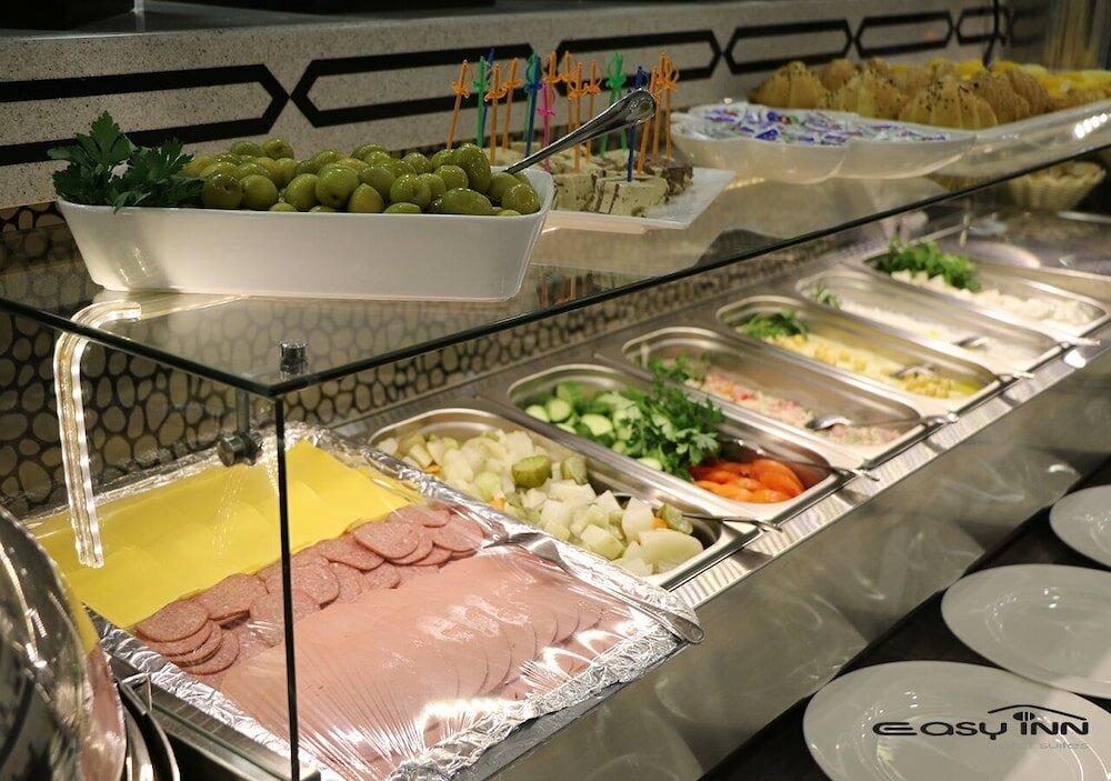 Фото Easy Inn Hotel Suites