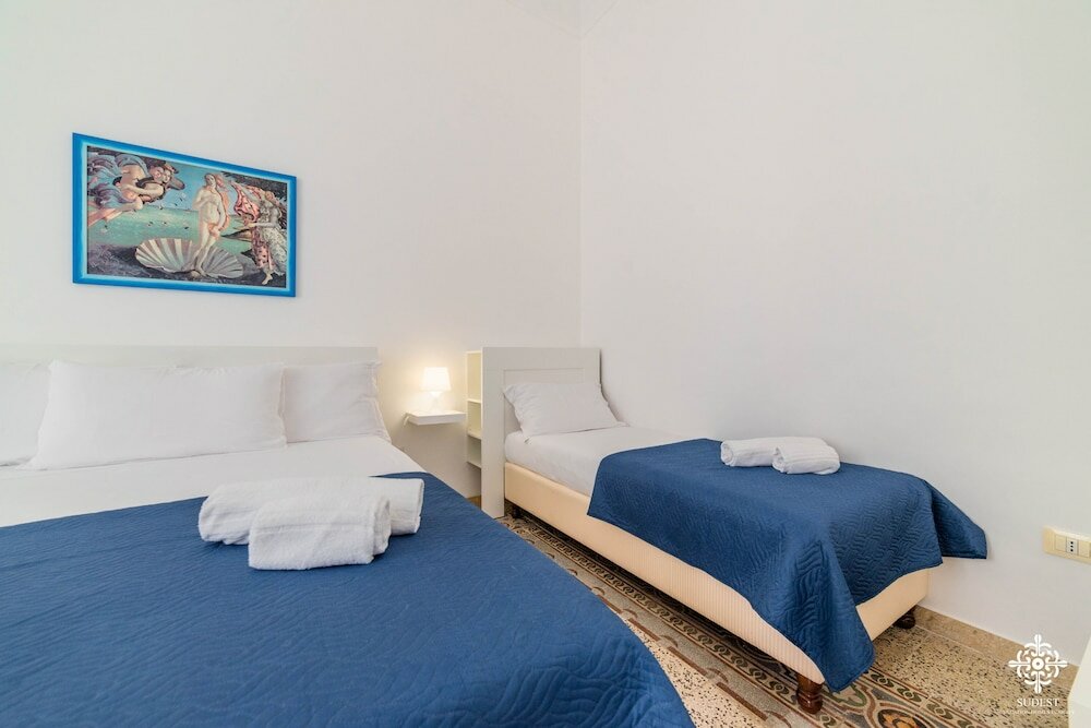 Фото Le 4 Perle Apartments