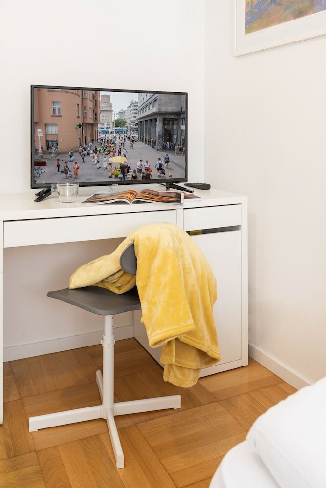 Фото Cozy and Bright Duplex Near City Center