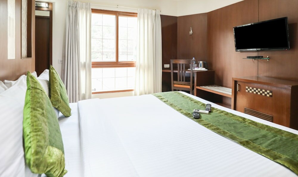 Фото Treebo Select Grand Premier Suites