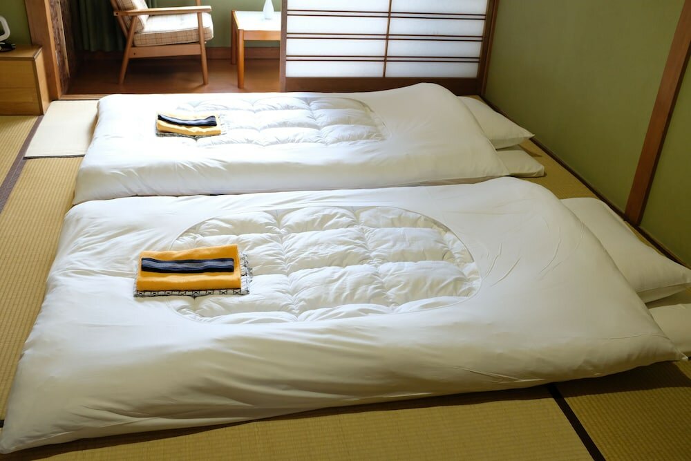 Фото Fujinoya Ryokan