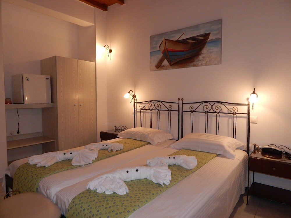 Фото Tinos Suites & Apartments