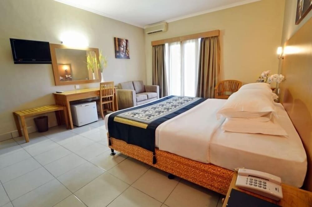 Фото Taman Rosani Hotel