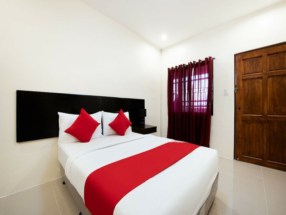 Фото Oyo 490 V-cat Apartelle