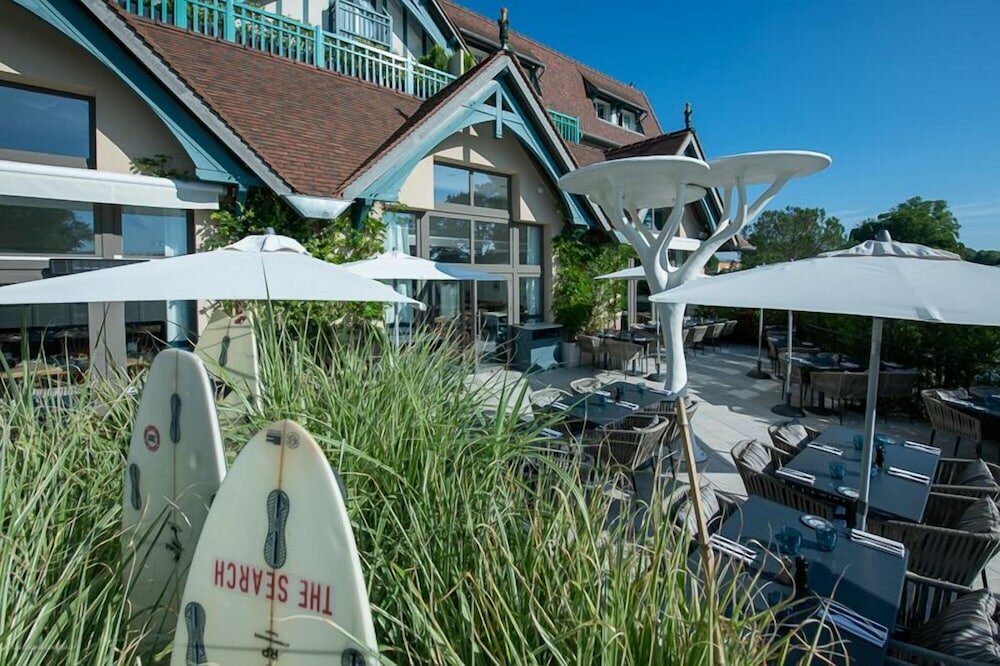 Фото Renaissance Paris Hippodrome De St. Cloud Hotel