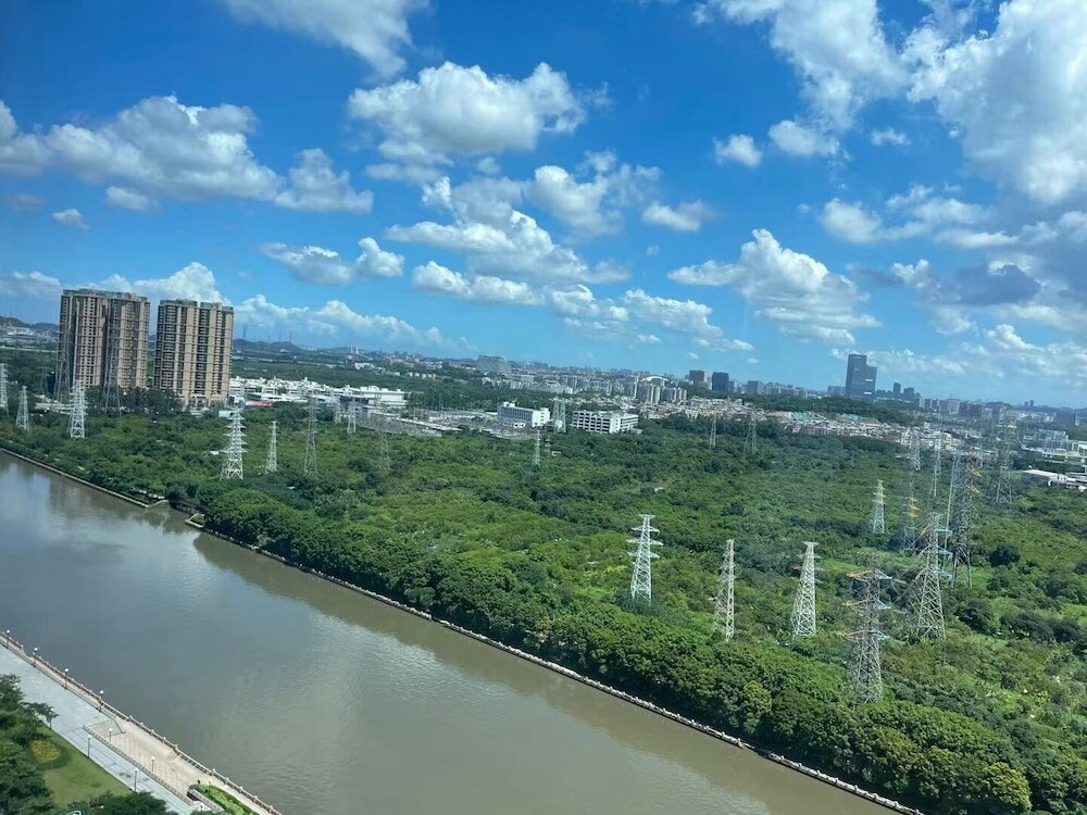 Фото Xingyi International Hotel Poly Store