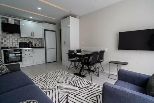 Апартаменты Comfy Home With Balcony in Muratpasa в Муратпаше