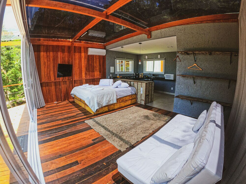 Фото Casa de Vidro - Hospedar com Propósito