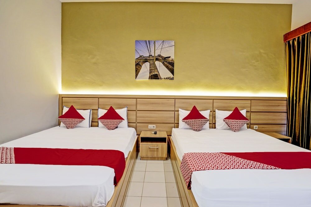 Фото Capital O 92162 Hotel Wisata Karya