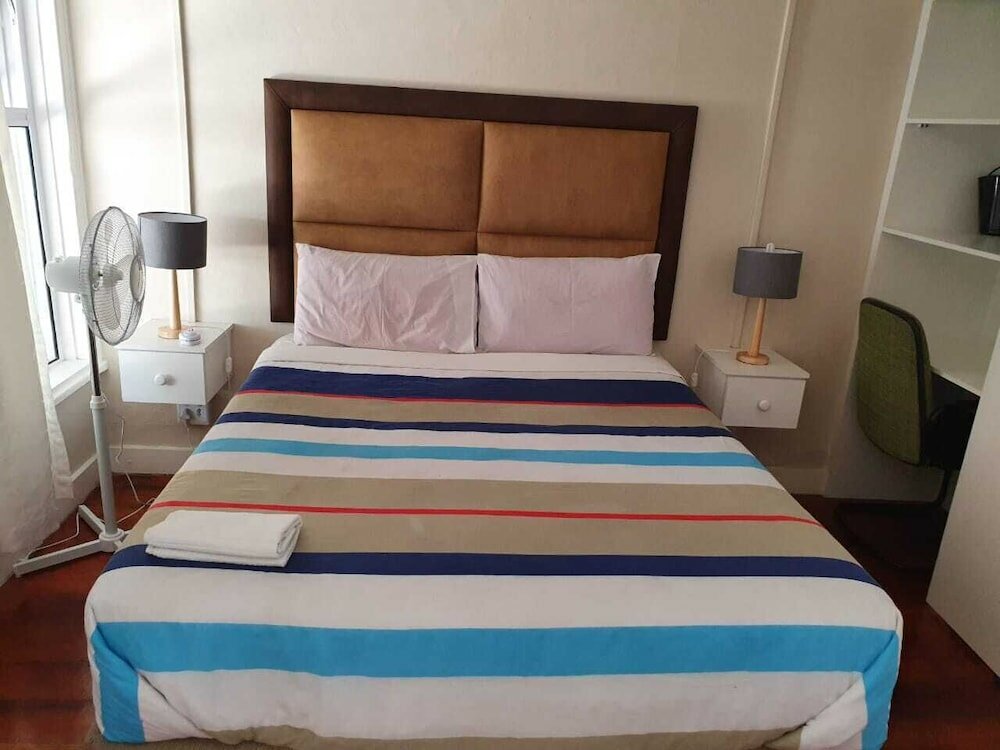 Фото The Monument Guesthouse