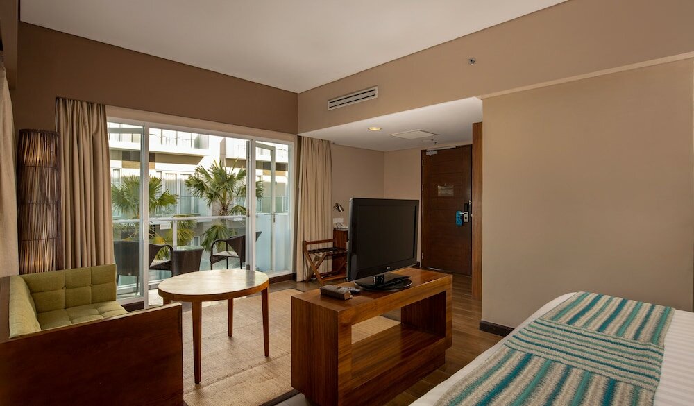 Фото Grand Ixora Kuta Resort