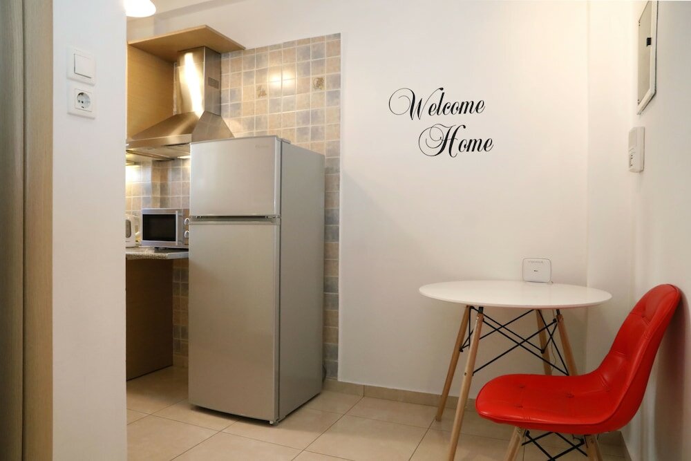 Фото Metaxourghio Boutique Apartment