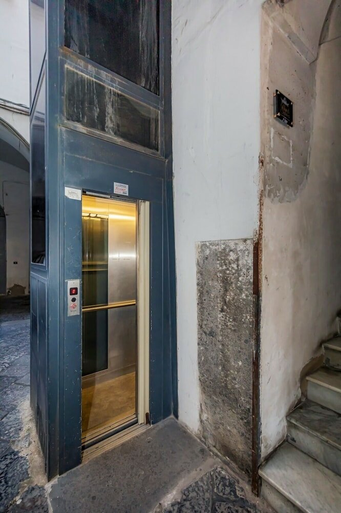 Фото Napoli Squares Suites