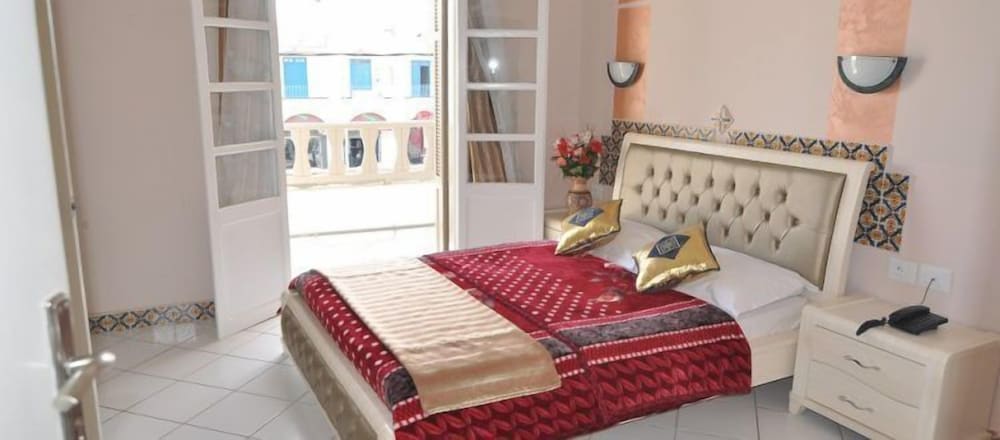 Фото Hôtel Les Palmes d'Or