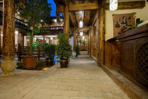 Гостиница The Purplevine Inn Lijiang