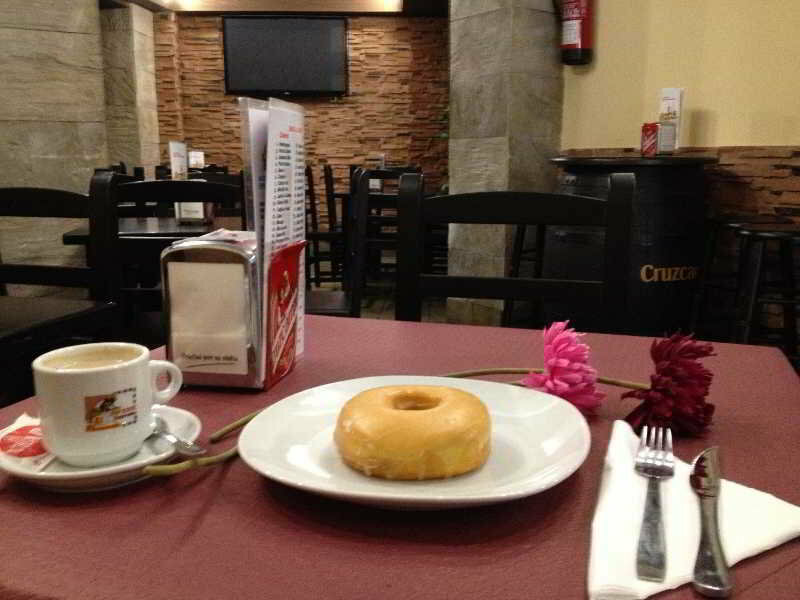 Фото Hostal Cuatro Canos