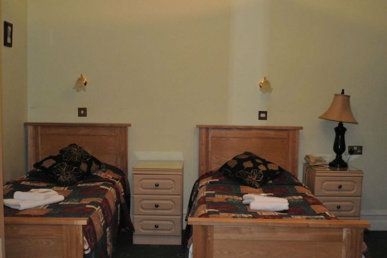 Фото Oyo Ridgeway Hotel