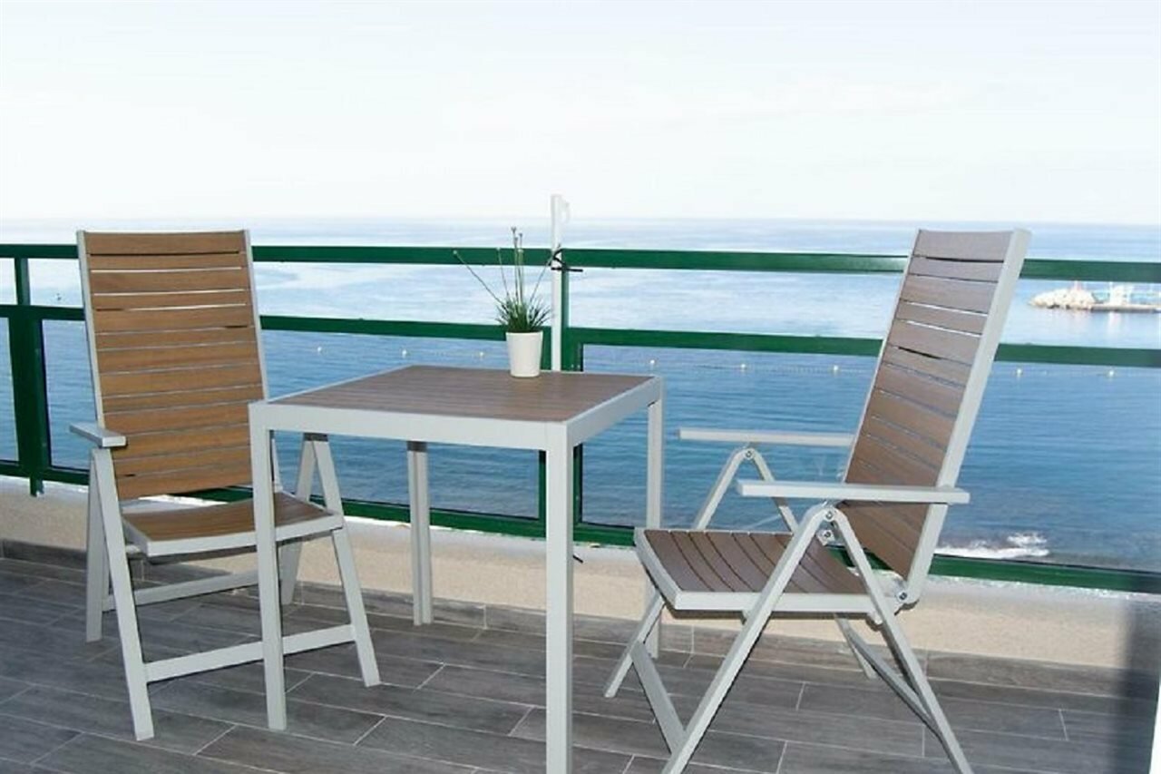 Фото Comodoro Apartments