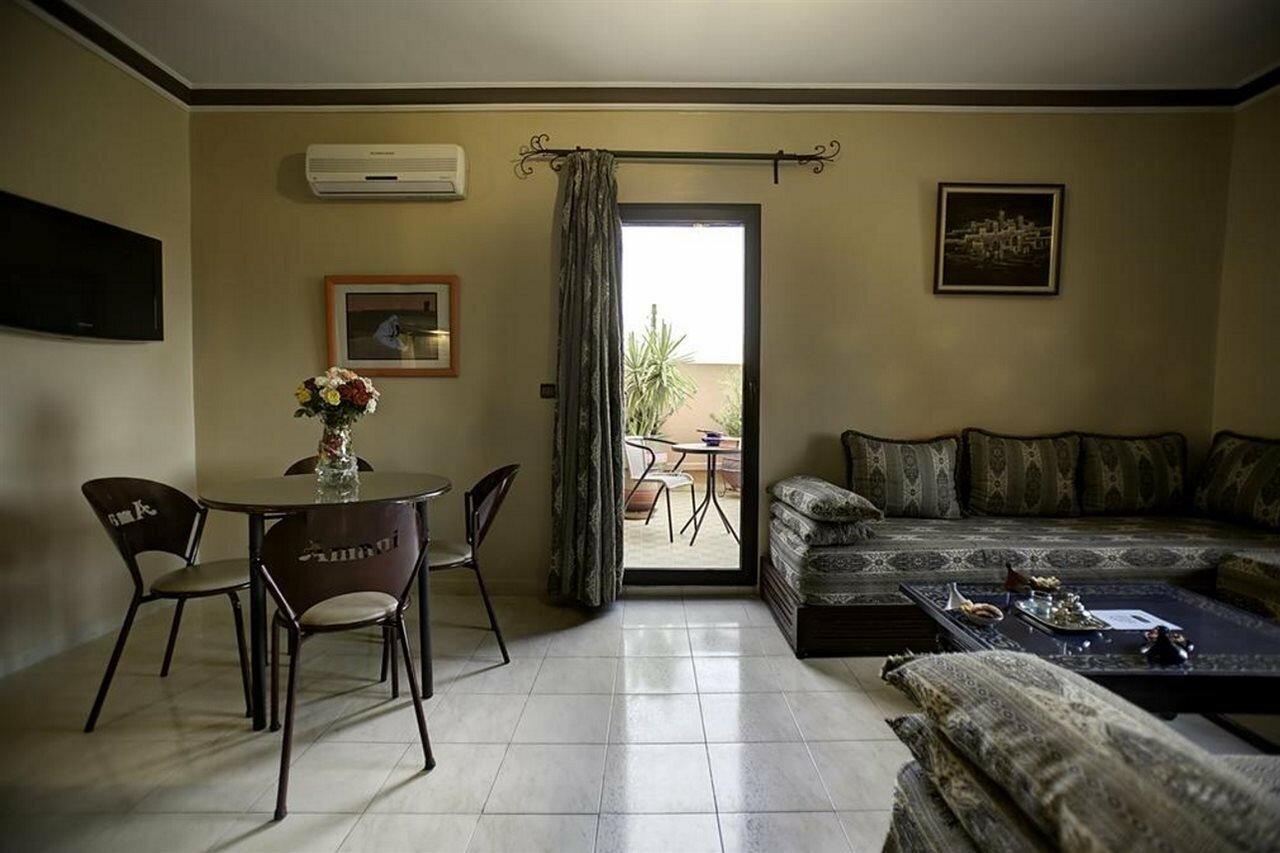 Фото Amani Hotel Suites & SPA