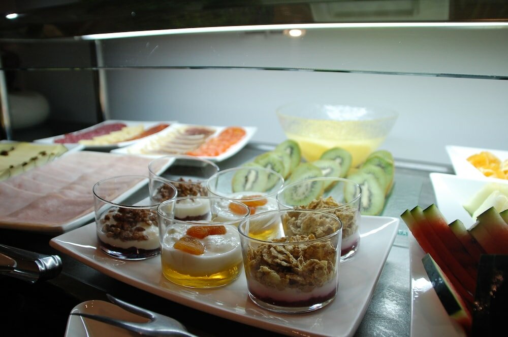 Фото Eco Alcala Suites