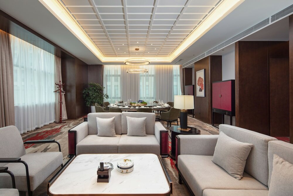 Фото Tiegang Jinjiangduchengjiudian