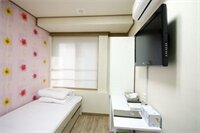 Фото Goodstay Tomo Residence