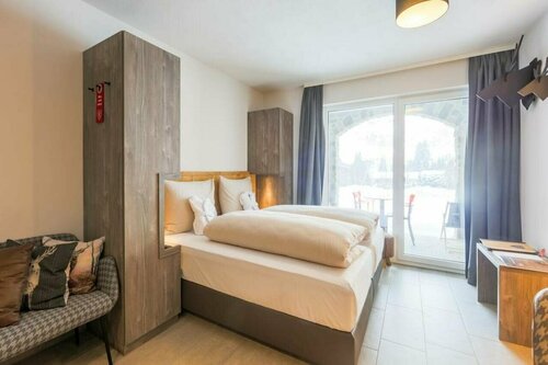 Гостиница Avenida Panorama Suites Kaprun в Капруне
