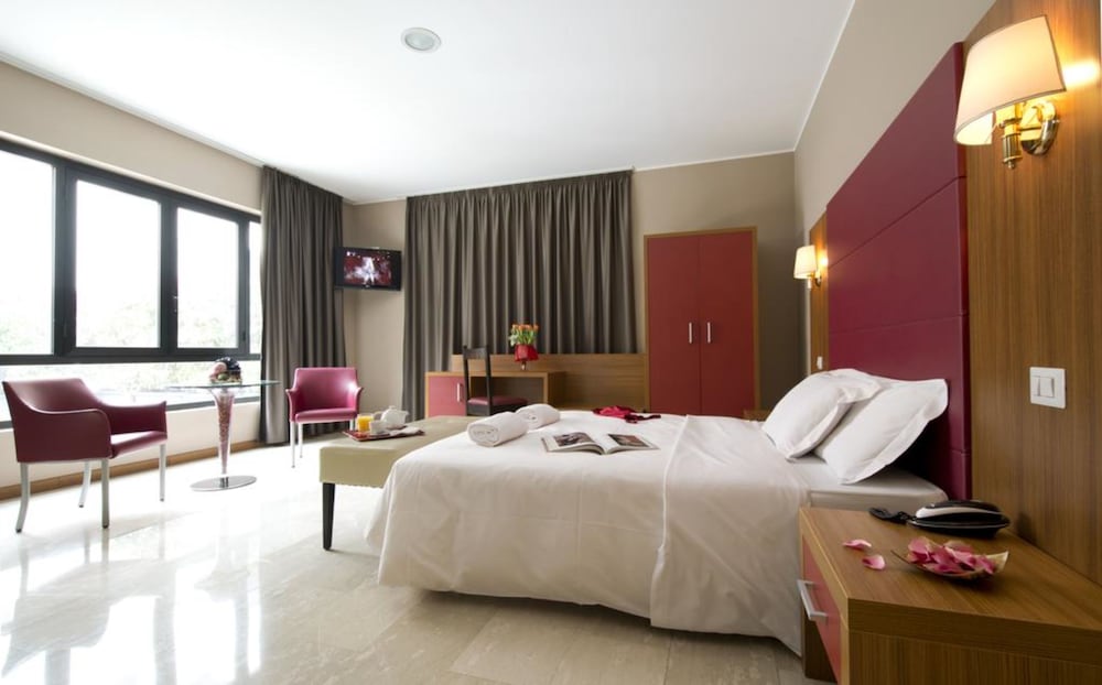 Фото Oasi Village Hotel