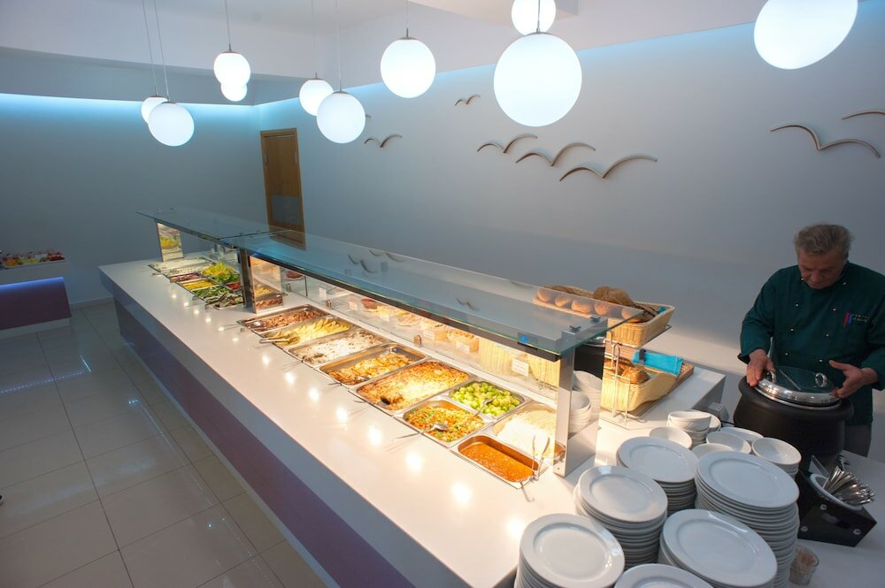 Фото Sunrise Village Hotel