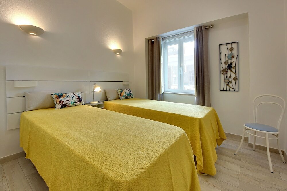 Фото Apartamentos Tucha