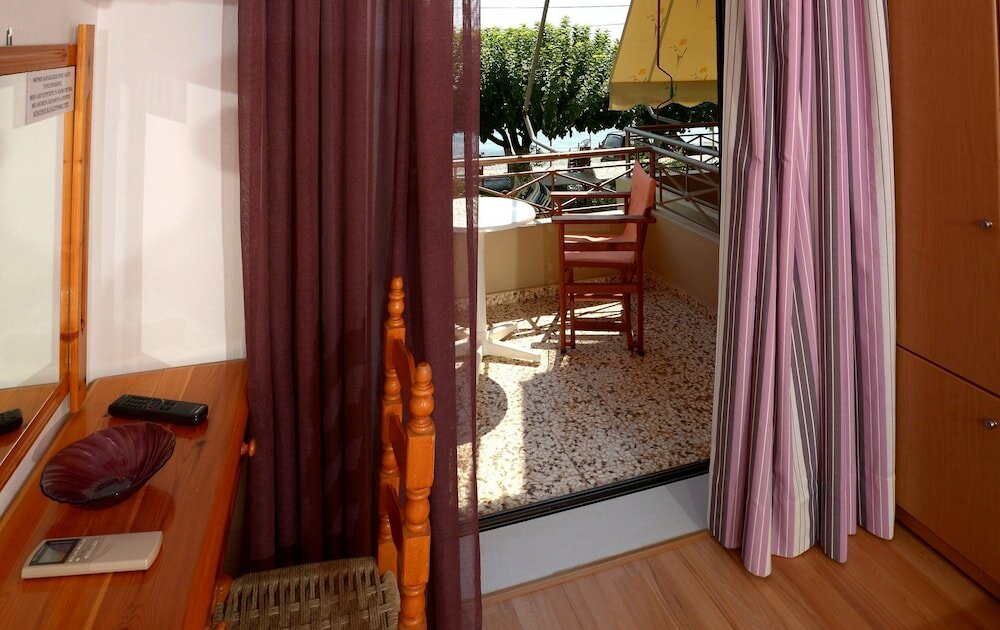 Фото Отель Pharos Rooms