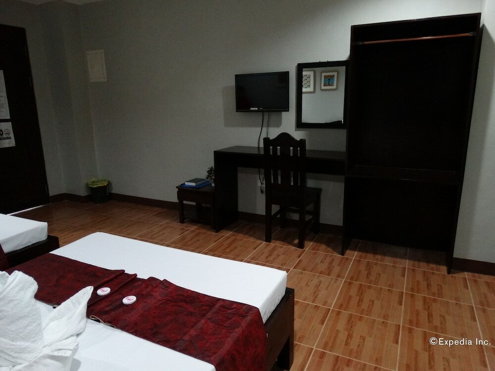 Фото Harbour Gardens Tourist Inn