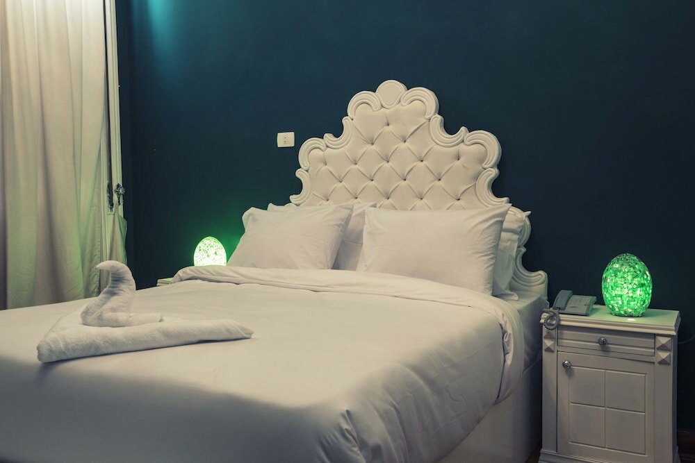 Фото Tahrir Plaza Suites