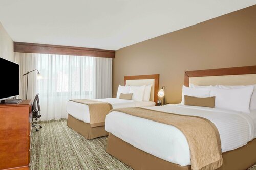 Гостиница Clarion Hotel & Suites