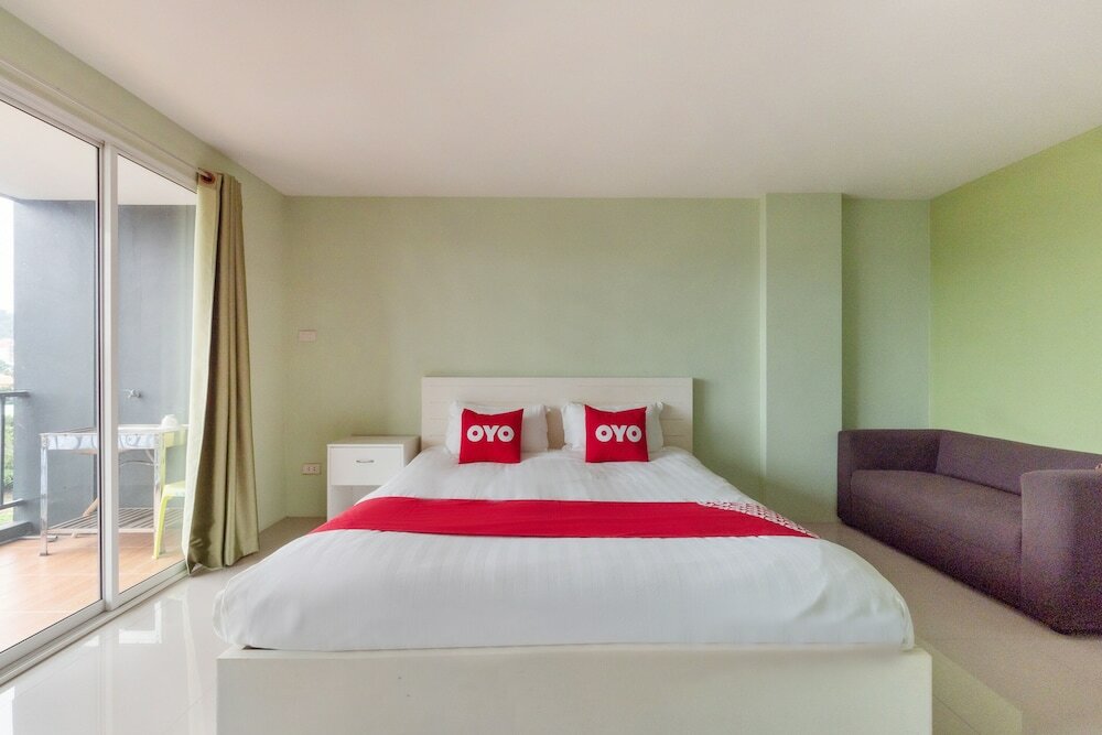 Фото Oyo 75363 V Place Apartment