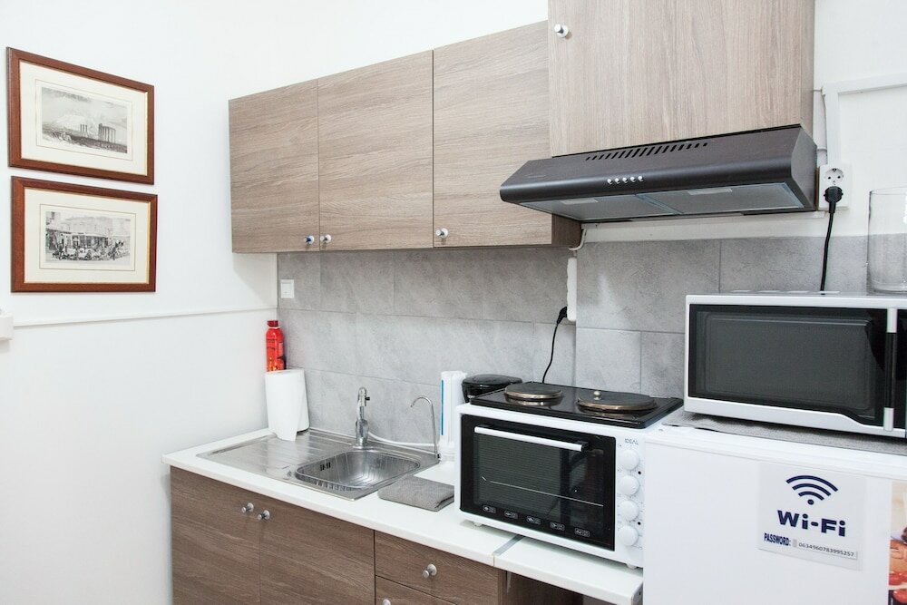 Фото Cozy apartment n Stavros Niarchos Park