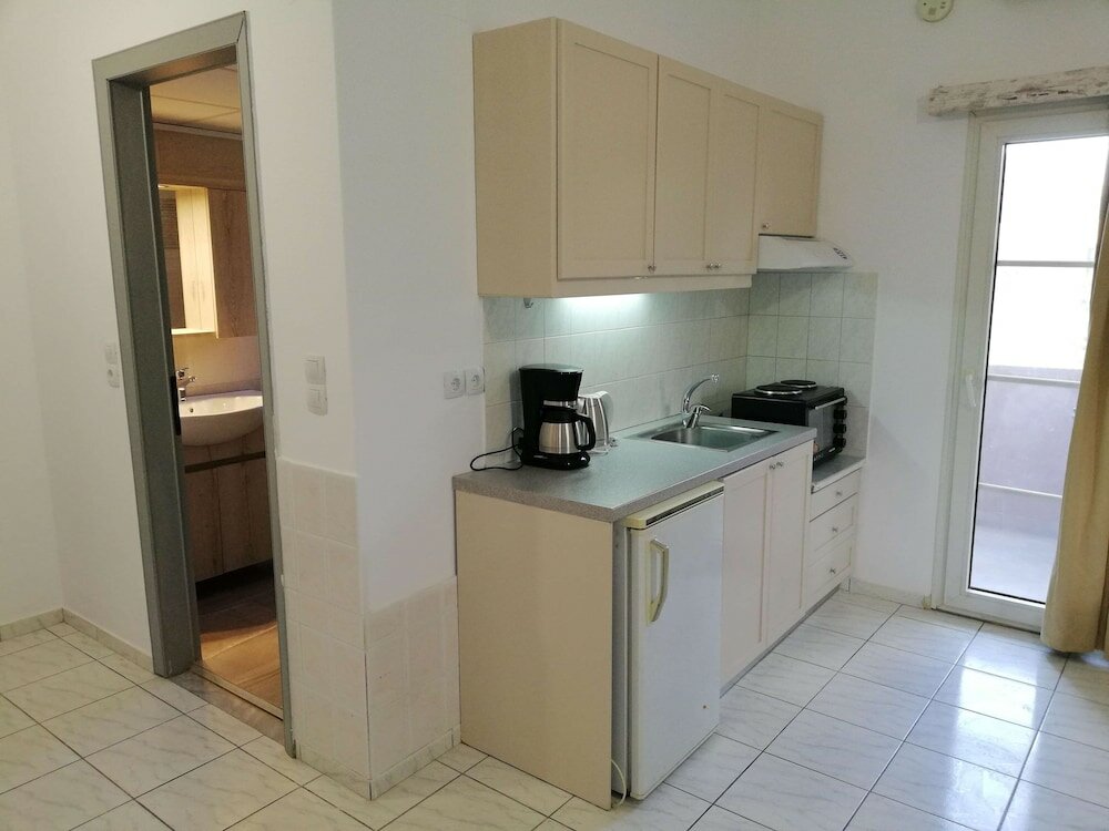 Фото Evina Rooms & Suites